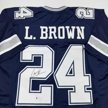 Dark blue custom sports jersey with white numbers and signature from Professional Sports League