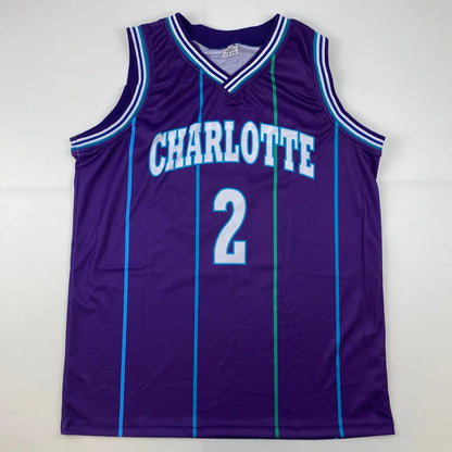 Purple custom jersey with teal and white accents from Johnson Basketball Sports League