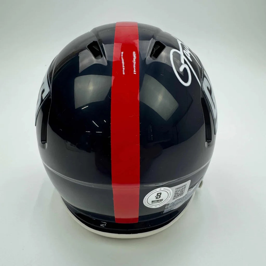 Dark blue Giants football helmet with red stripe and white signature, third party authentication