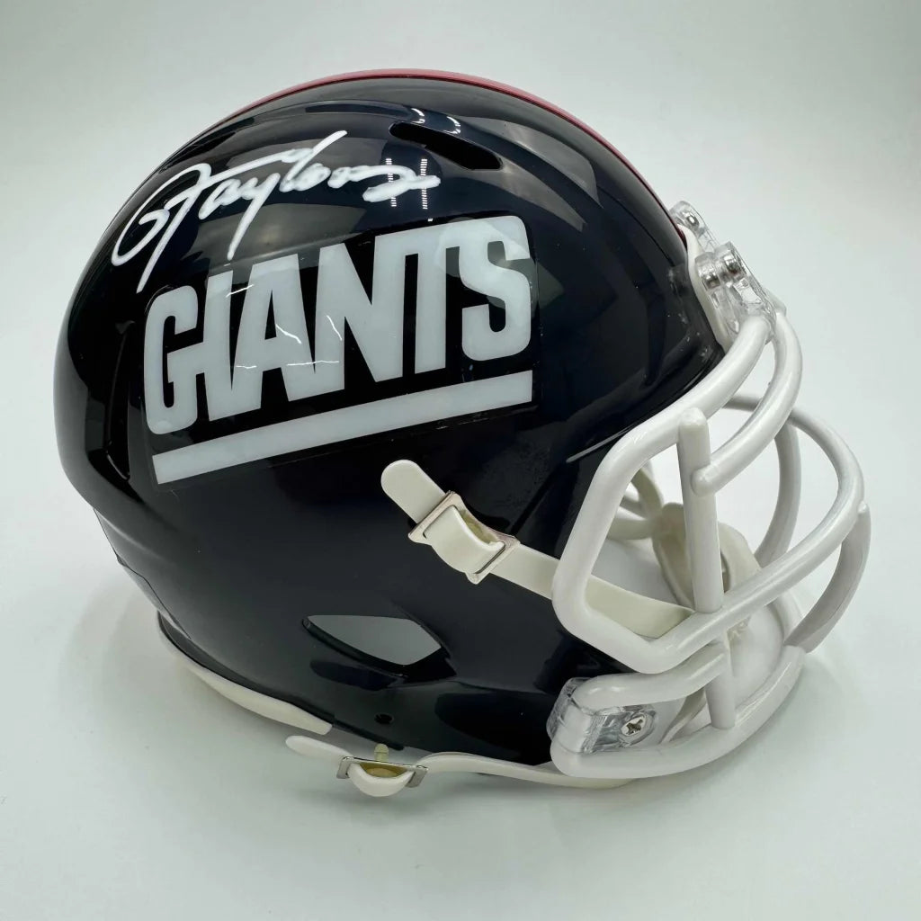 Autographed black New York Giants football helmet with third party authentication guarantee