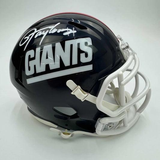 Autographed black New York Giants football helmet with third party authentication guarantee