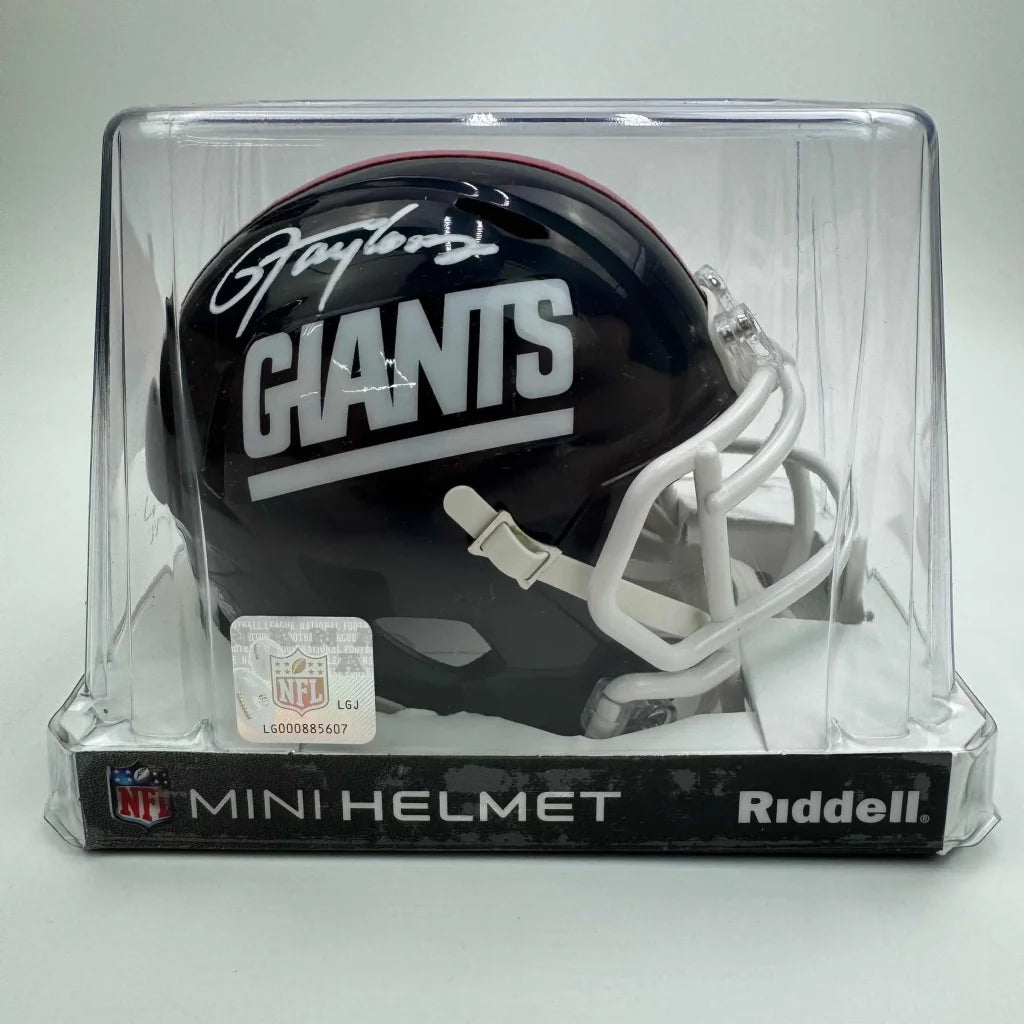 Black New York Giants mini football helmet with signature in clear display case, third party authentication