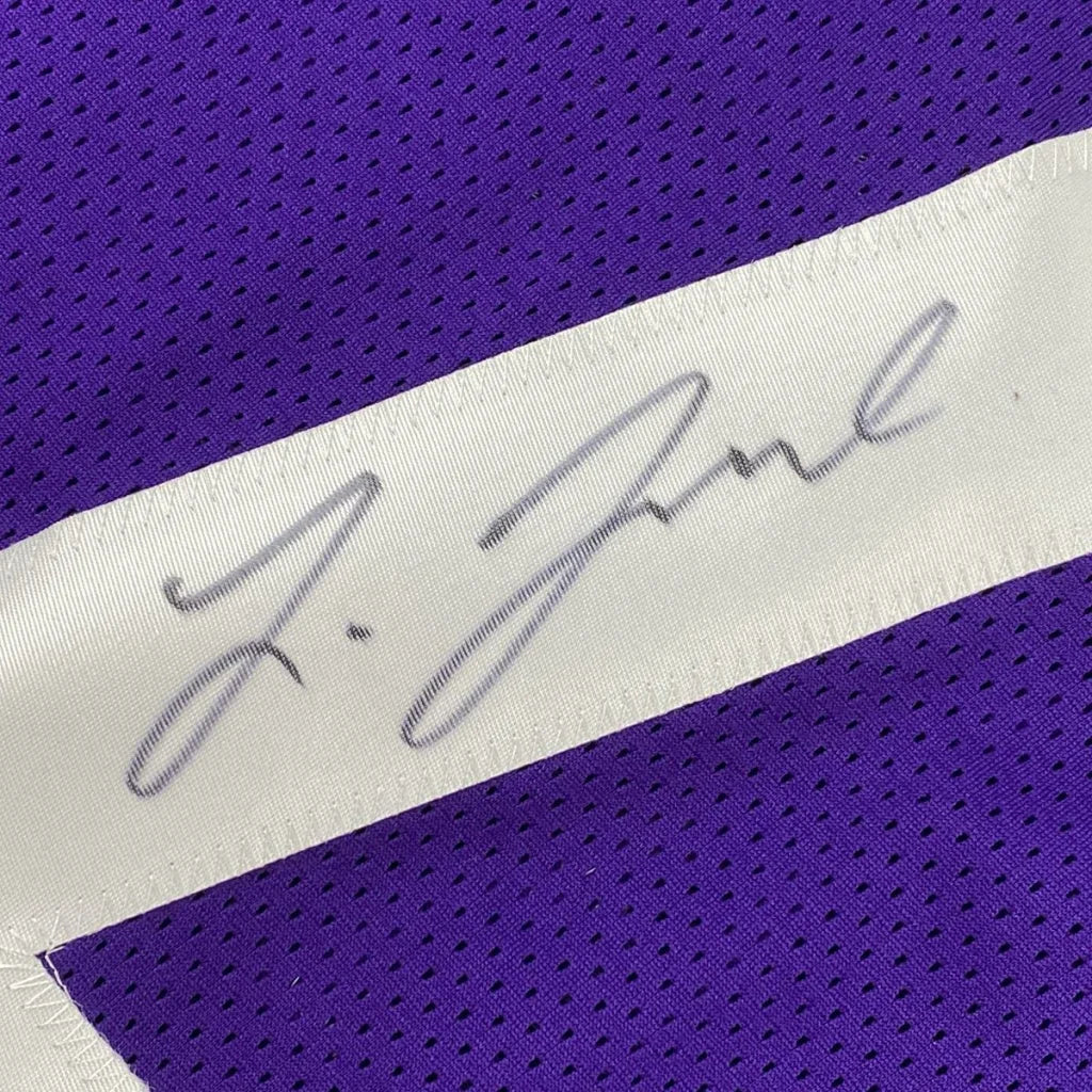 Autographed purple mesh custom jersey with white stripe and silver ink signature from professional sports league athlete