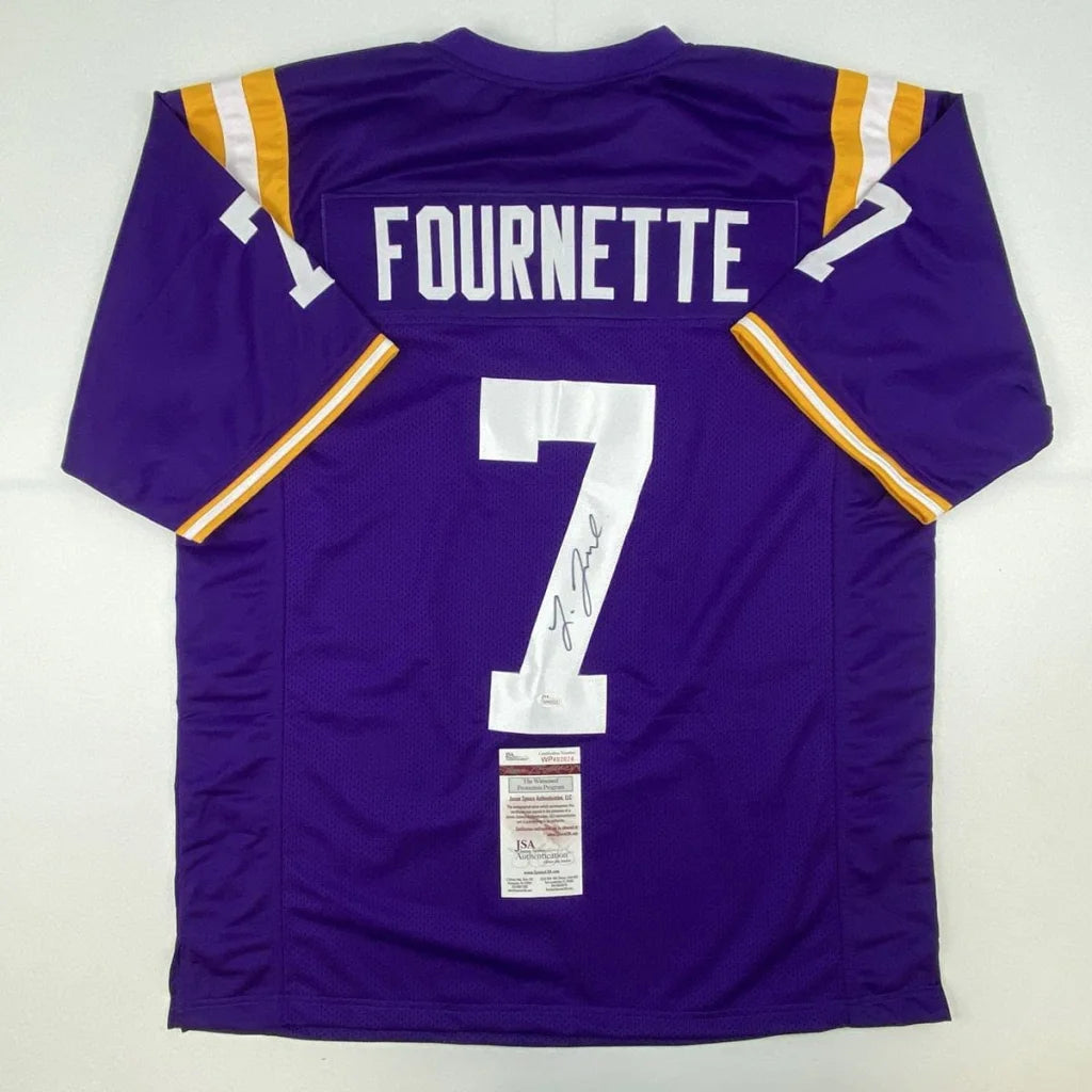 Back of purple louisiana tech bulldogs custom jersey with white and gold trim featuring fournette number 7 for professional sports league fans