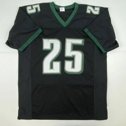Black and green custom jersey with number 25 from Authentic McCoy Professional Sports League