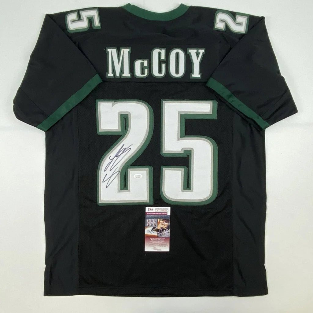 Black custom jersey from Professional Sports League with McCoy 25 and autograph