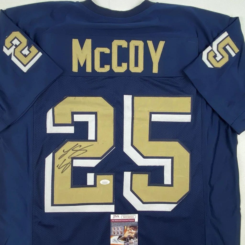 Blue number 25 McCoy football jersey with autograph, perfect for professional sports fans