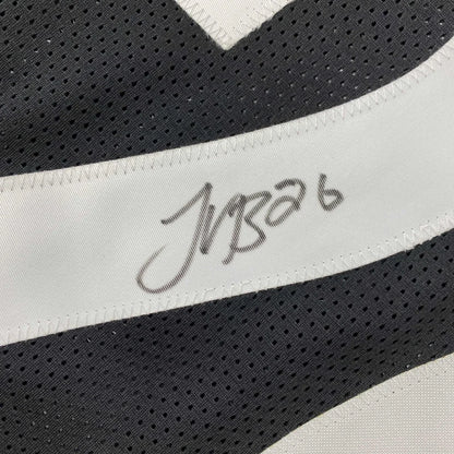 Black athletic jersey with white stripe and signature from Authentic Bell 26 custom jersey for professional sports league