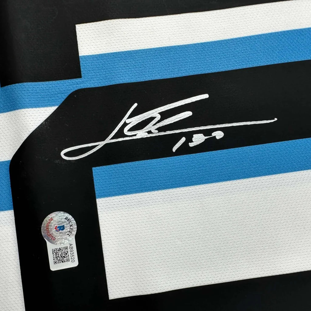 Autographed black, blue, and white striped custom jersey from professional sports league
