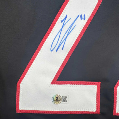 Autographed Logan Stankoven custom jersey with number 4, Beckett COA