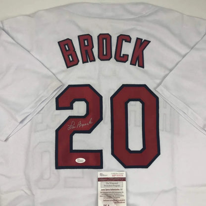 White Lou Brock signed custom jersey from professional sports league with BROCK 20 on back