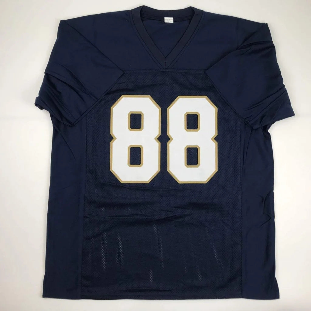 Navy blue custom jersey featuring white and gold number 88 signed Lou Holtz 1988 Notre Dame college football memorabilia