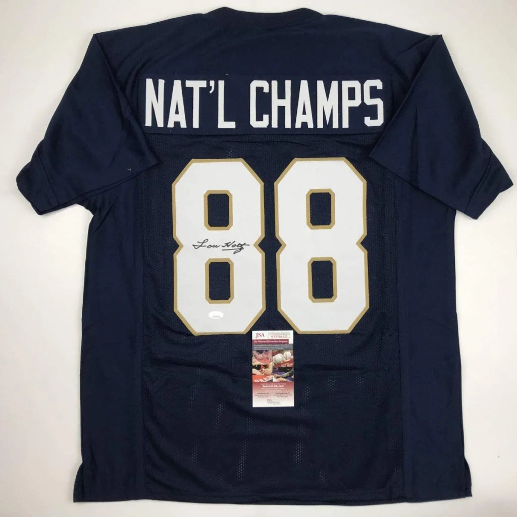 Navy blue custom jersey featuring white and gold number 88 and natl champs across shoulders signed by lou holtz from professional sports league