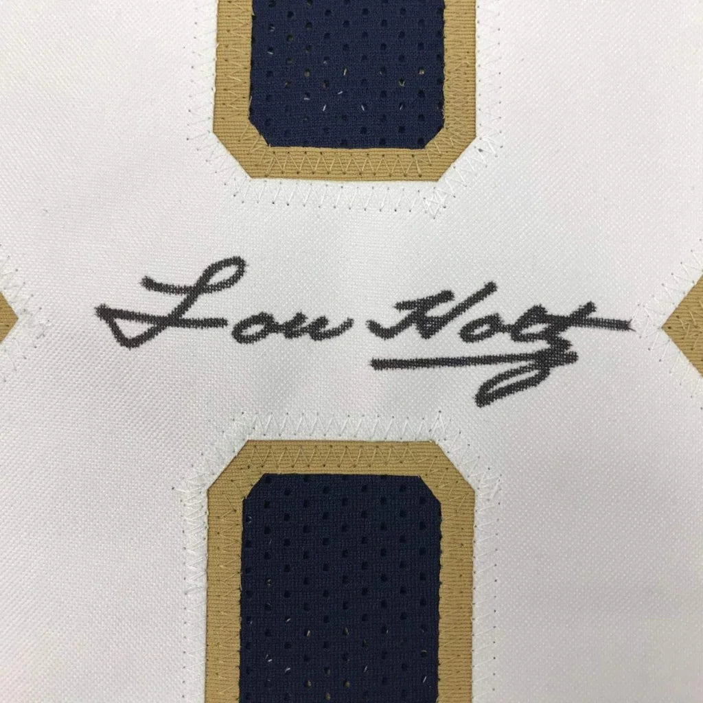 Autographed white custom jersey with navy blue and gold accents from professional sports league Lou Holtz 1988 champs