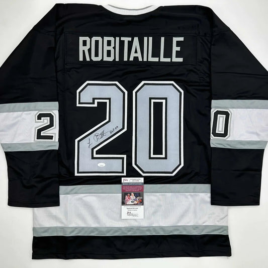Black custom Jersey signed by Luc Robitaille in professional sports league with PSA/DNA sticker