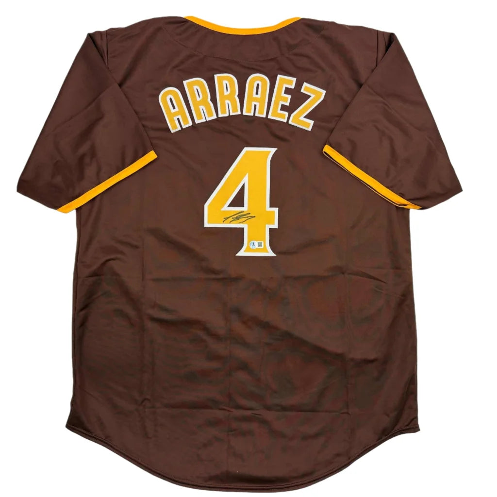 Brown custom jersey with yellow trim and number 4 signed by a pro sports league star