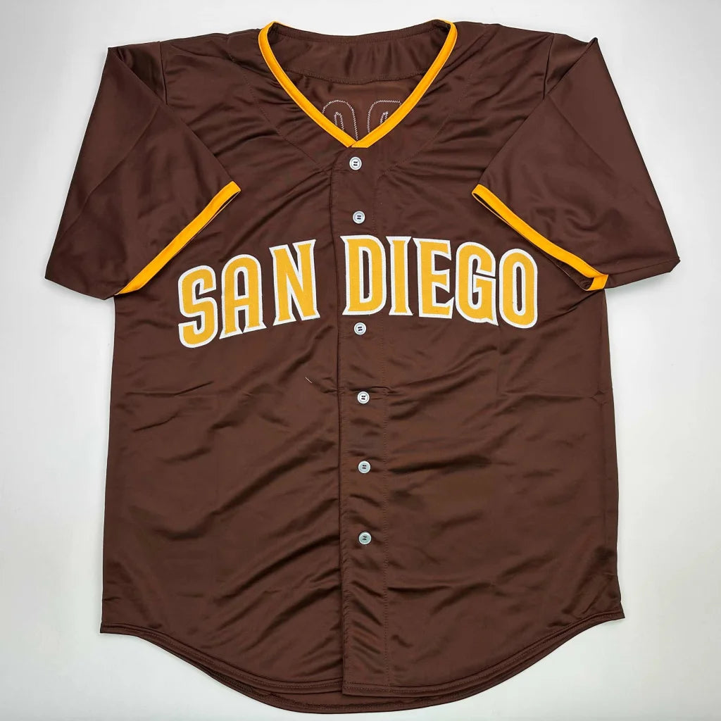 Brown short-sleeve custom jersey with SAN DIEGO in yellow, autographed by a pro sports star