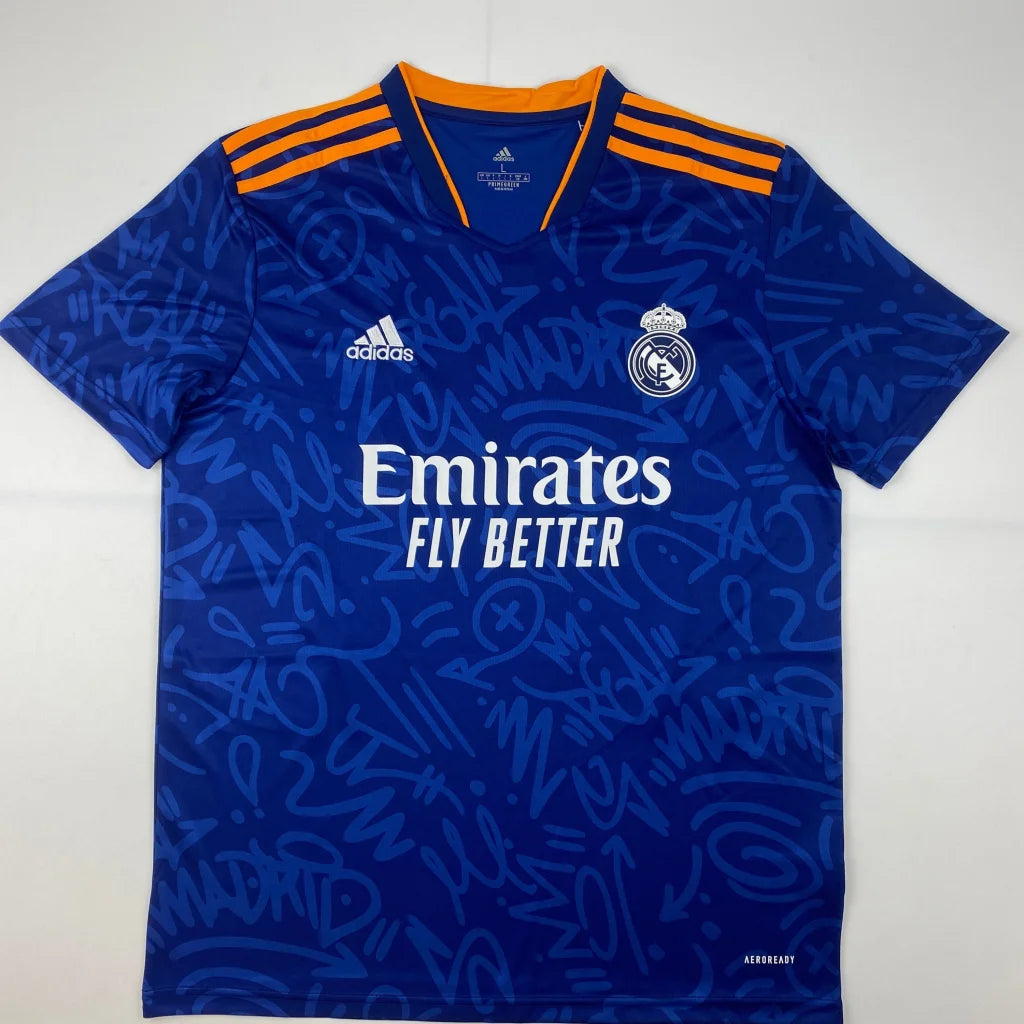 Blue short-sleeved football jersey with orange accents from signed Modric Real Madrid professional sports league