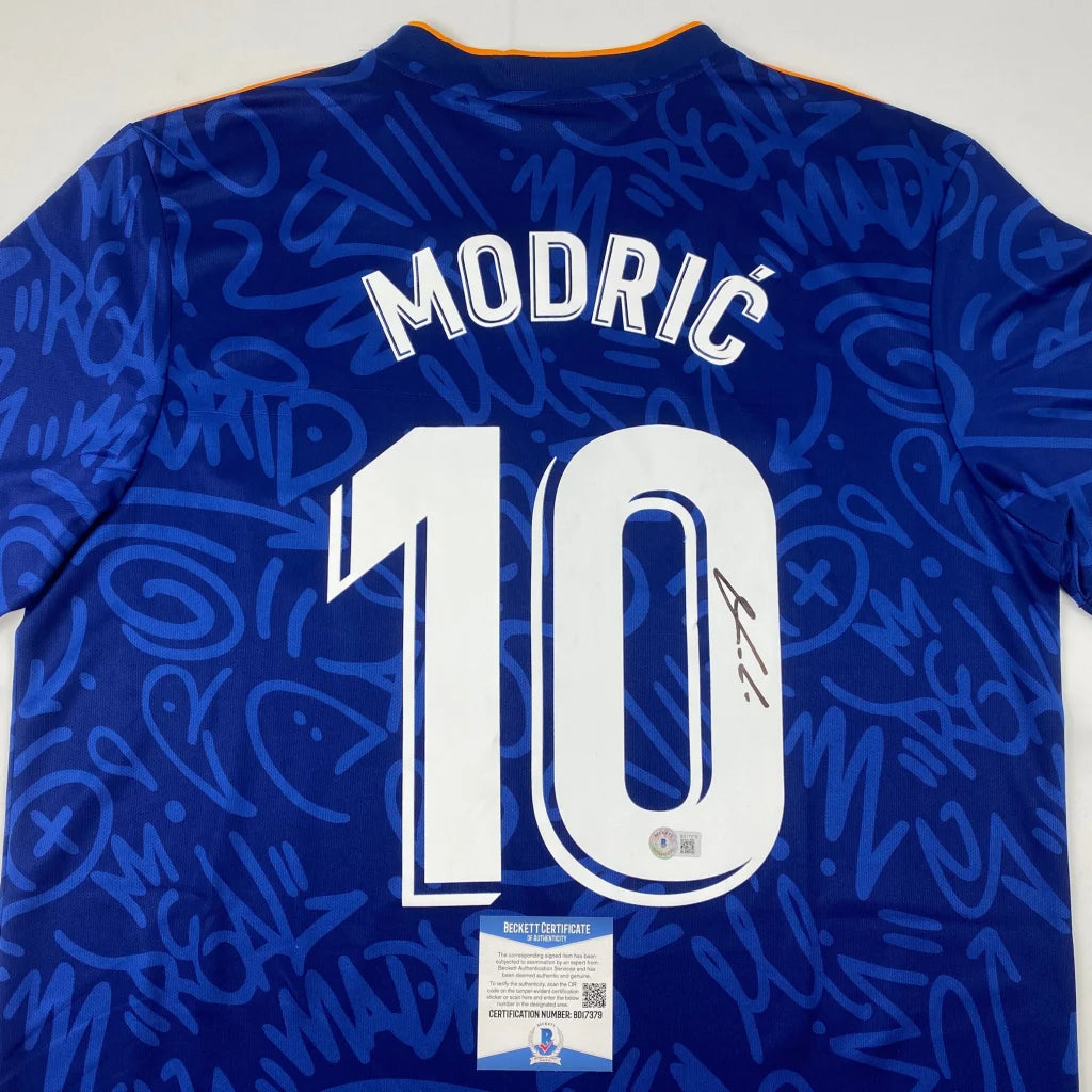 Autographed Luka Modric Real Madrid Blue Soccer Jersey Beckett BAS COA | Certified Authentic Signed Memorabilia | vintageantiquesgifts.com