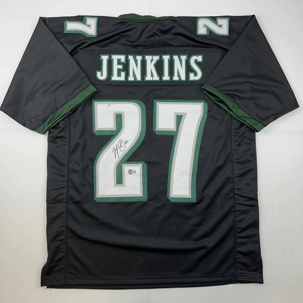 Black and green custom jersey with JENKINS 27 for professional sports league fans