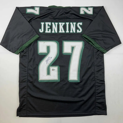 Black and green custom jersey with JENKINS 27 for professional sports league fans
