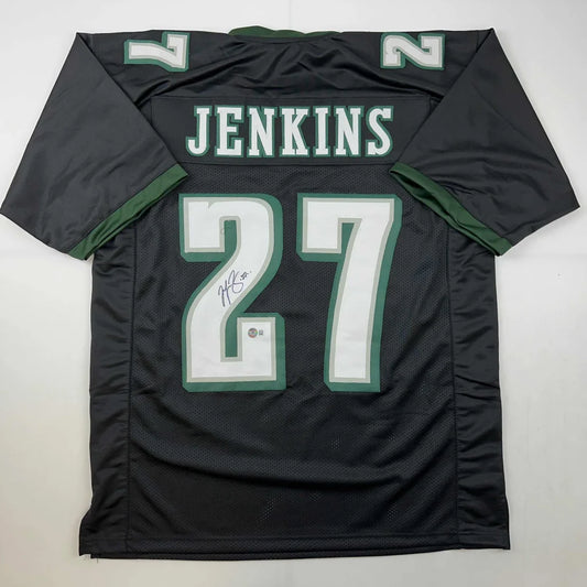 Black and green custom jersey with JENKINS 27 for professional sports league fans