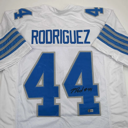 Autographed Malcolm Rodriguez Detroit White Football Jersey Beckett BAS COA | Certified Authentic Signed Memorabilia | vintageantiquesgifts.com