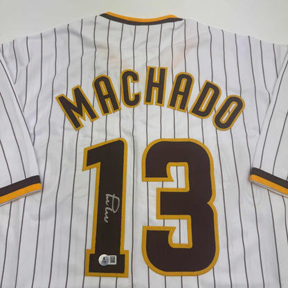 Autographed Manny Machado San Diego Pinstripe Baseball Jersey Beckett BAS COA | Certified Authentic Signed Memorabilia | vintageantiquesgifts.com