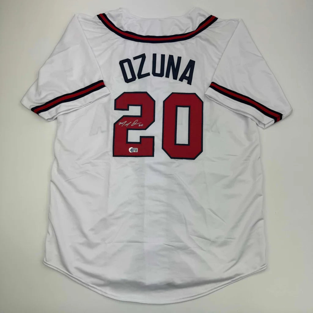White Ozuna custom jersey with Beckett BAS COA, pro sports autograph, red and black trim