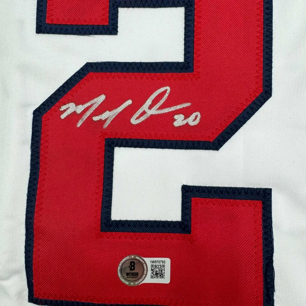 Autographed white custom jersey with red navy number 2 and Beckett BAS COA for professional sports