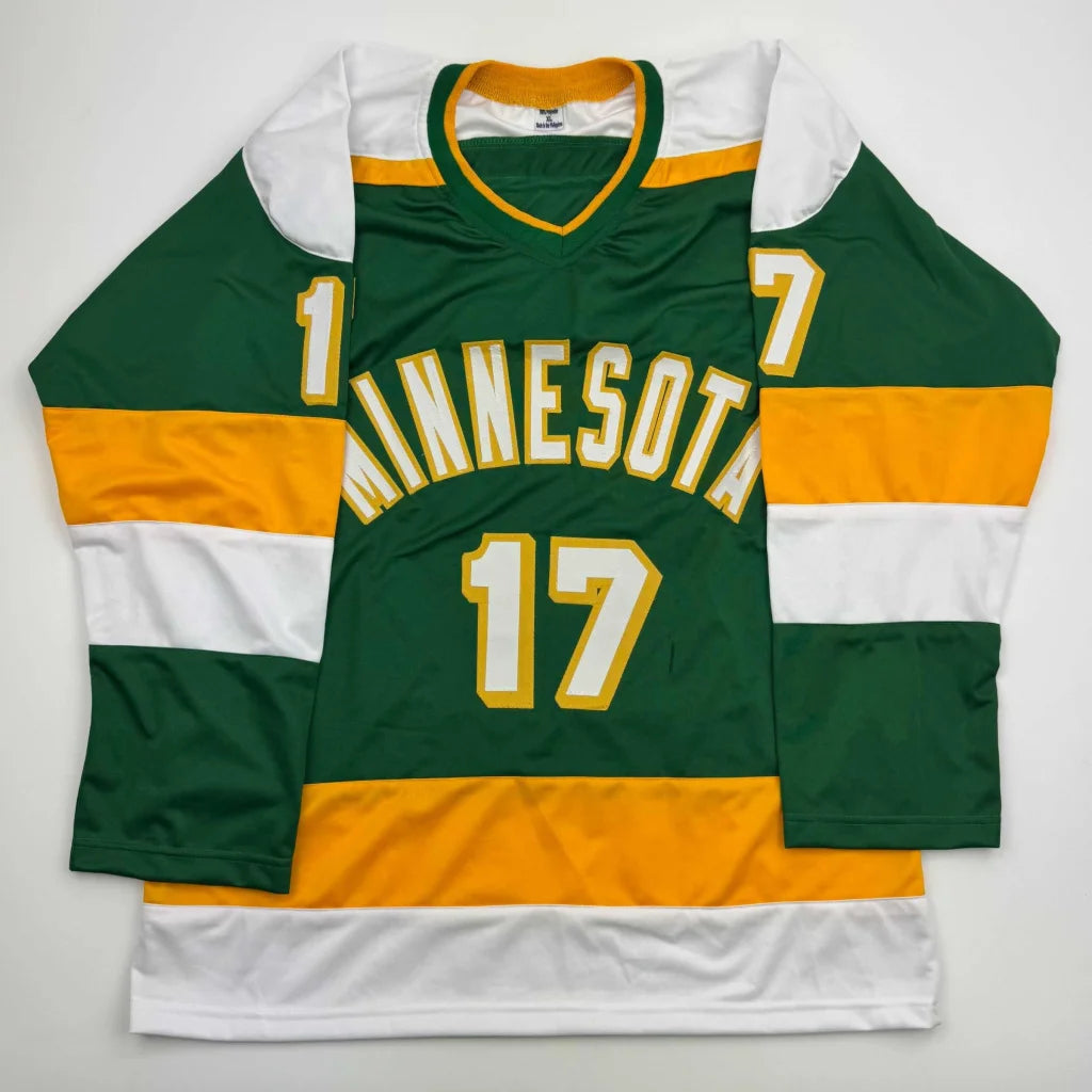 Autographed Marcus Foligno custom jersey in green and gold with white accents number 17 from professional sports league