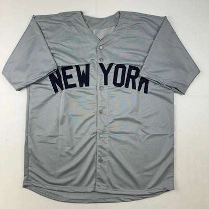 Gray Mariano Rivera custom jersey with NEW YORK text, autographed with Beckett BAS COA