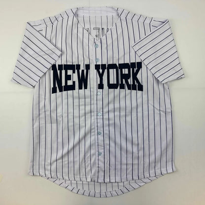 Autographed Mariano Rivera New York pinstripe custom jersey, professional sports
