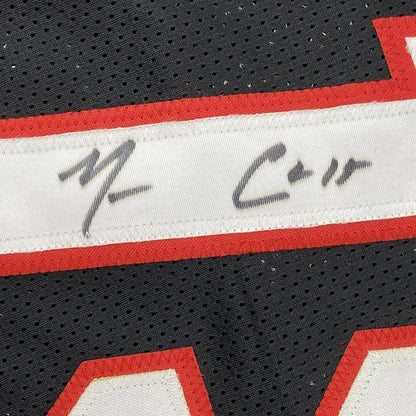 Black mesh sports jersey with red and white trim and faded autograph, Mario Chalmers Miami custom jersey with JSA COA