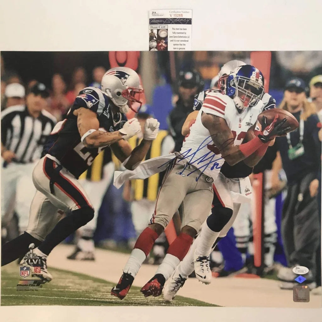 Autographed Giants vs Patriots photo with third party authentication of catch play