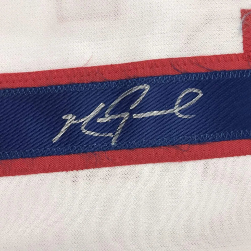 White fabric with blue and red striped ribbon and autograph on Signed Custom Jersey Grace 17