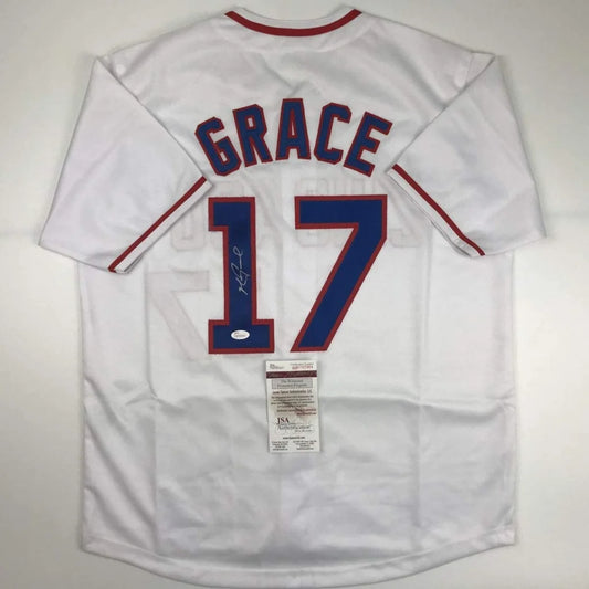 Signed white custom jersey with red trim and blue 17, perfect for pro sports fans