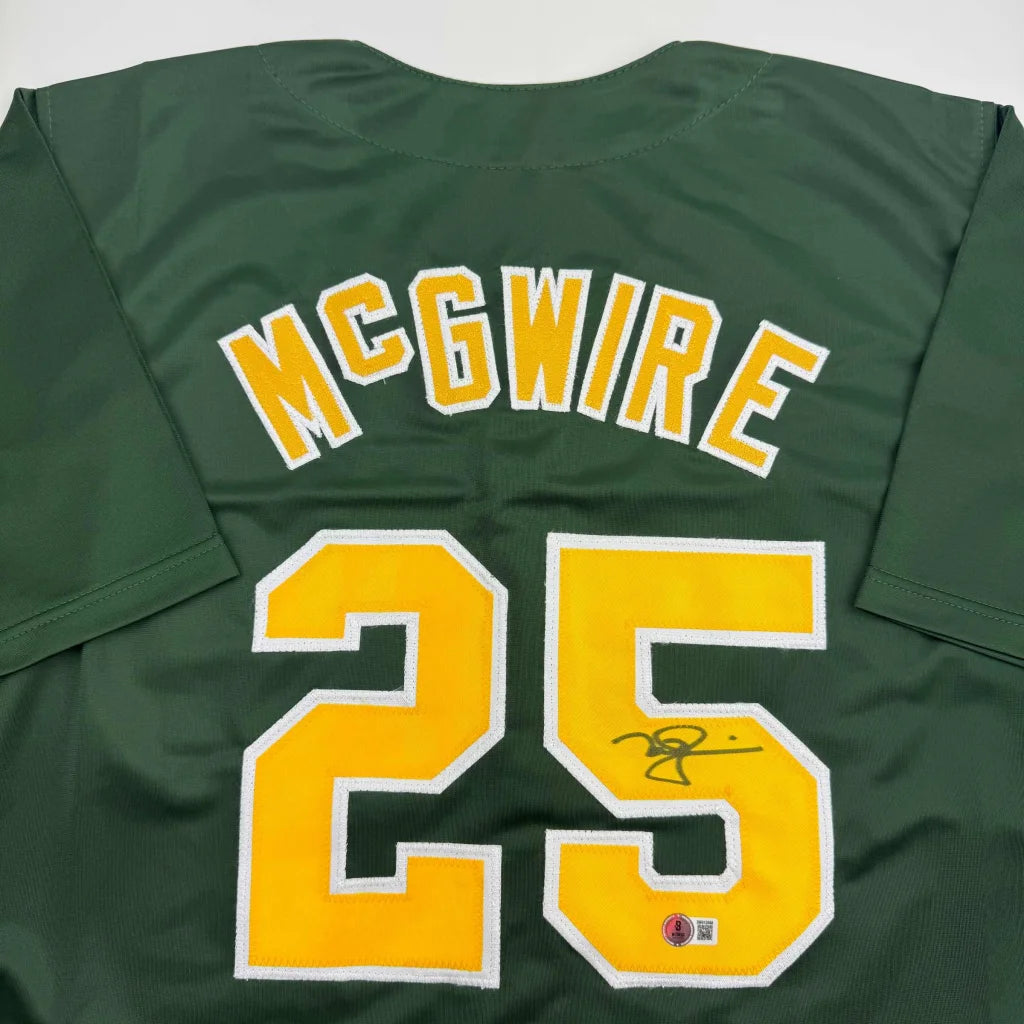 Autographed Mark McGwire Oakland Green Baseball Jersey Beckett BAS COA | Certified Authentic Signed Memorabilia | vintageantiquesgifts.com
