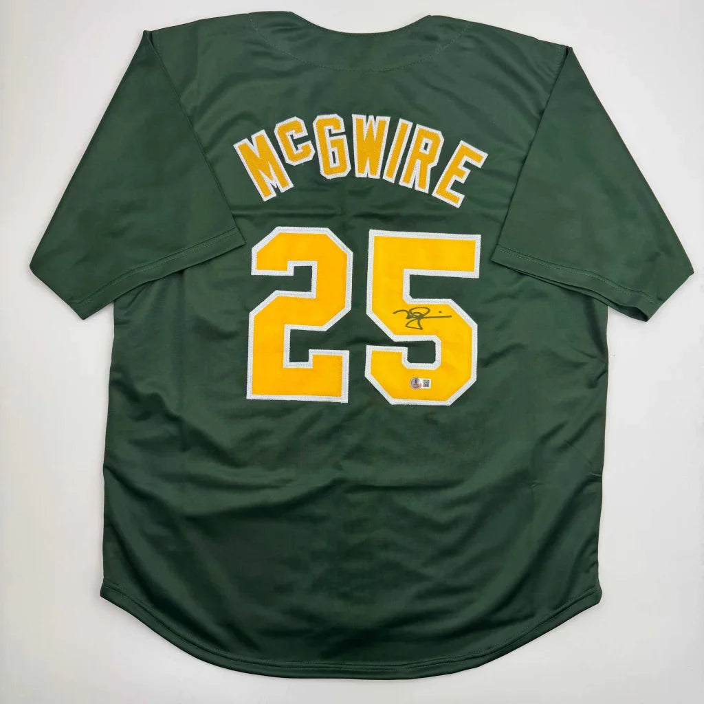 Autographed Mark McGwire Oakland Green Baseball Jersey Beckett BAS COA | Hall of Fame Sports Memorabilia | vintageantiquesgifts.com