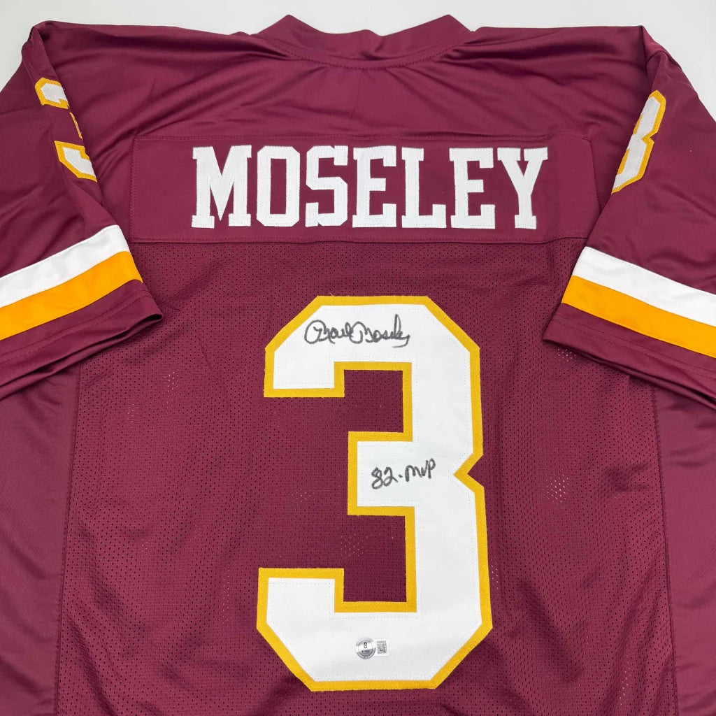 Maroon custom jersey signed by Dan Monk, a pro sports league MVP memorabilia piece