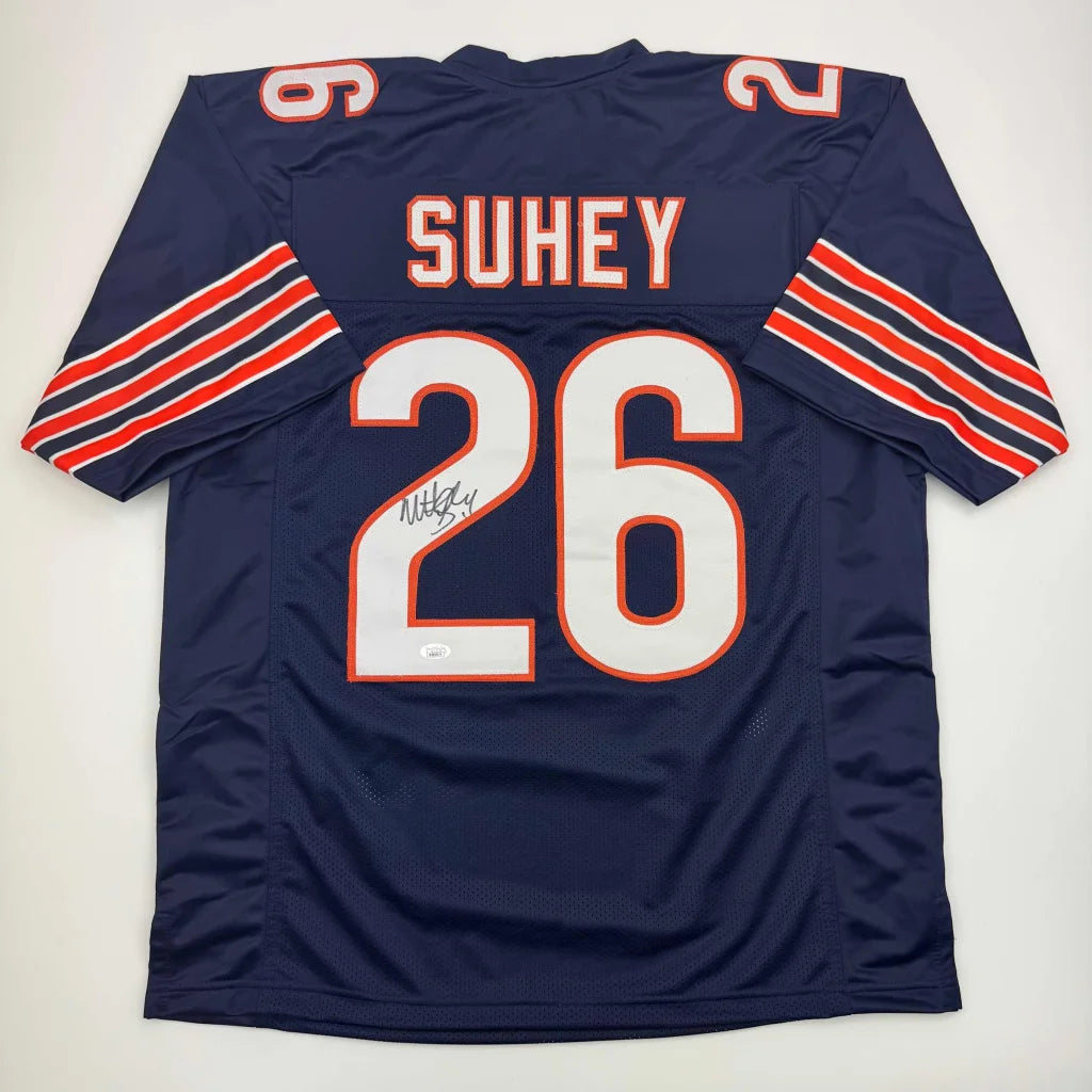 Navy blue professional sports league custom jersey with SUHEY 26 autograph and orange stripes