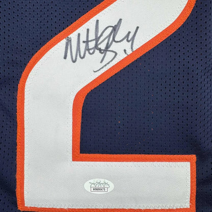 Autographed professional sports league custom jersey with authentication sticker