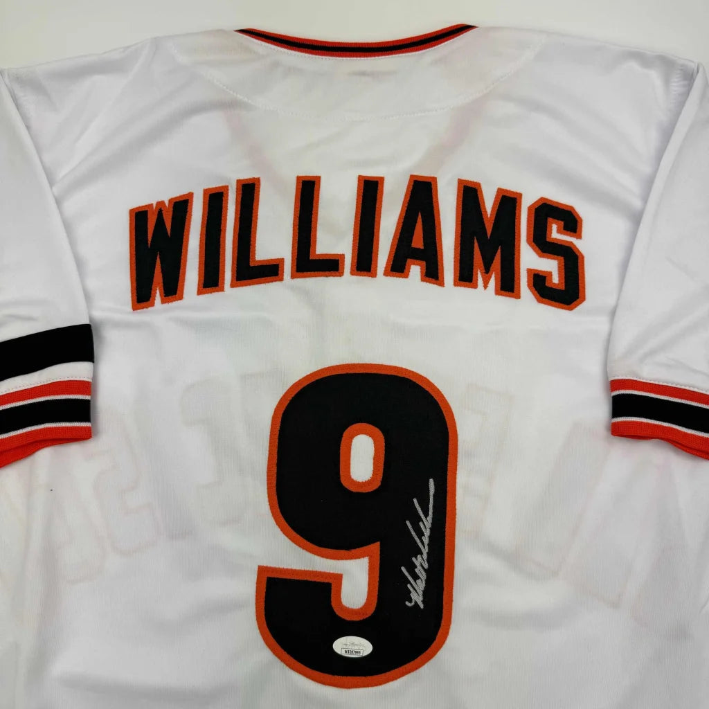 White custom jersey with black and orange trim from Williams 9 professional sports league