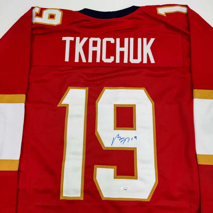Autographed Matthew Tkachuk Florida Red Hockey Jersey JSA COA | Certified Authentic Signed Memorabilia | vintageantiquesgifts.com