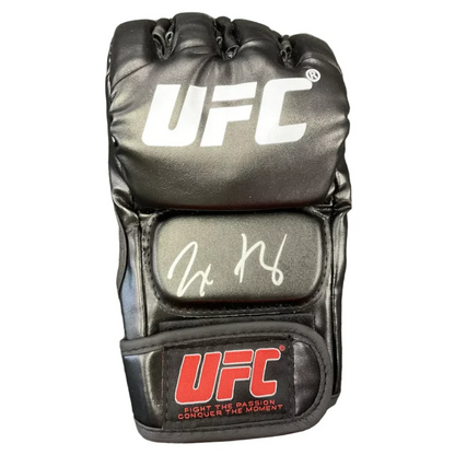 Black UFC MMA glove with white autograph and third party authentication for authenticity