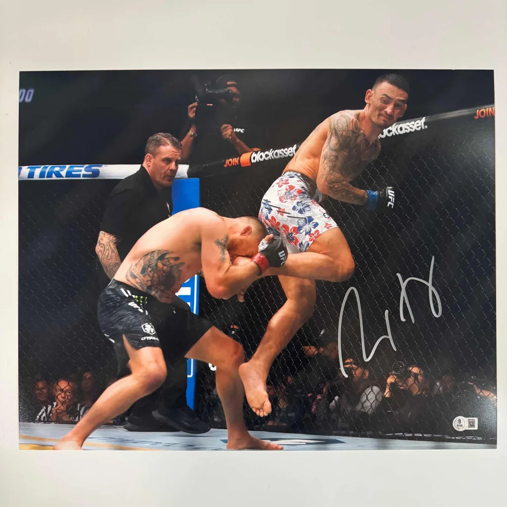 Autographed MMA fight photo with third party authentication of two male fighters in cage