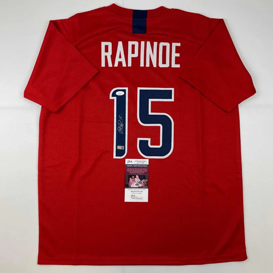 Red Megan Rapinoe World Cup jersey with signature and authentication tag for professional sports