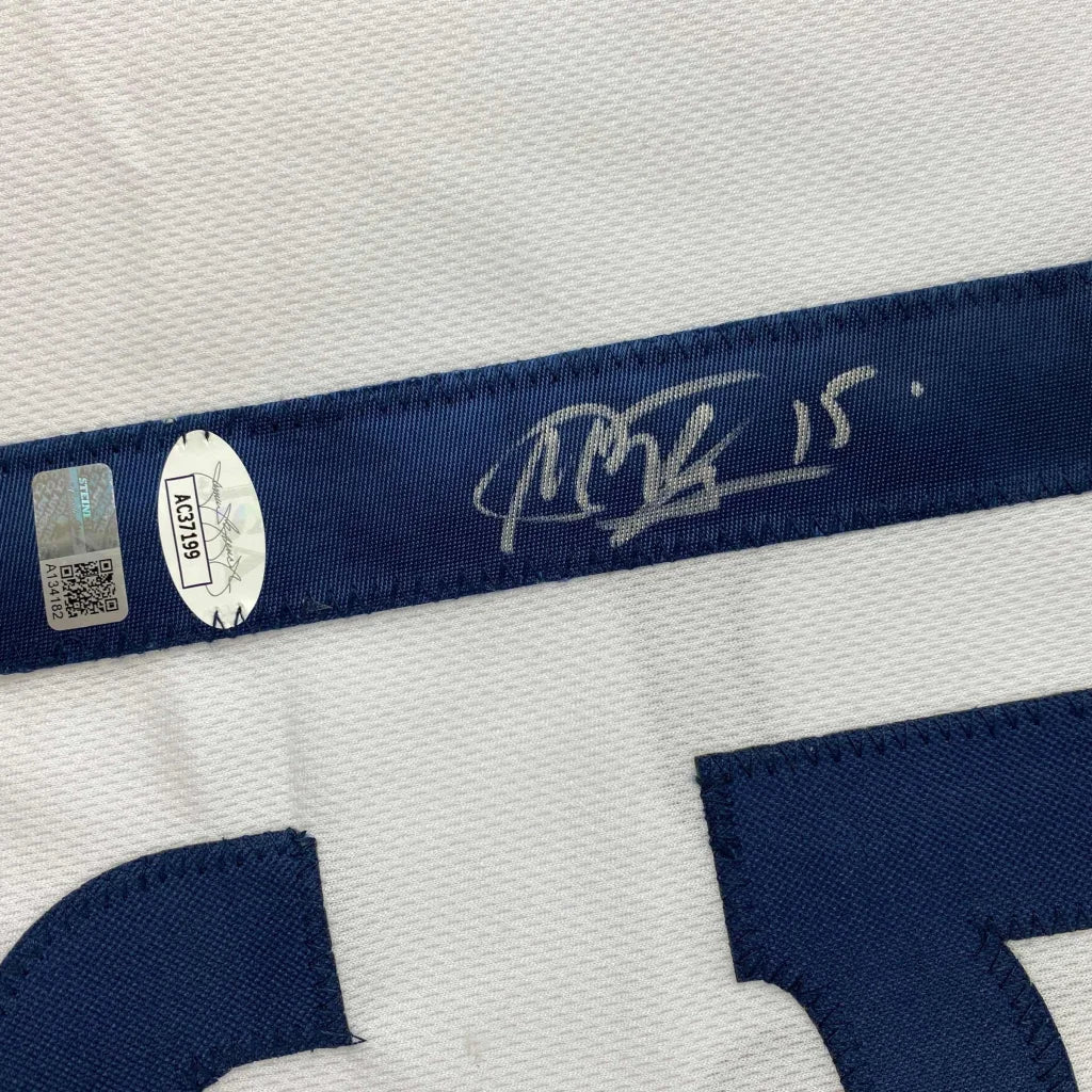 White fabric with blue stripe and silver autograph from Rapinoe 15 sports league jersey