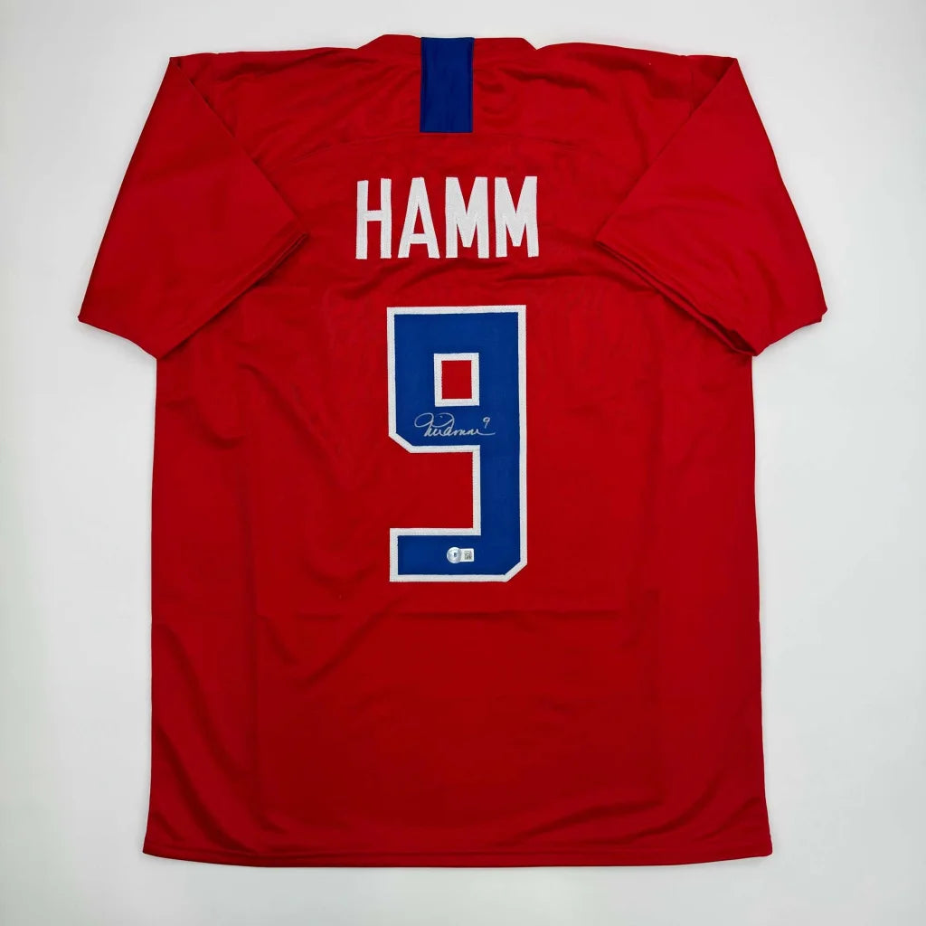 Autographed Mia Hamm red Team USA soccer jersey with white Hamm and blue 9