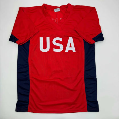 Red and navy blue short-sleeved custom jersey from Mia Hamm signed sports memorabilia